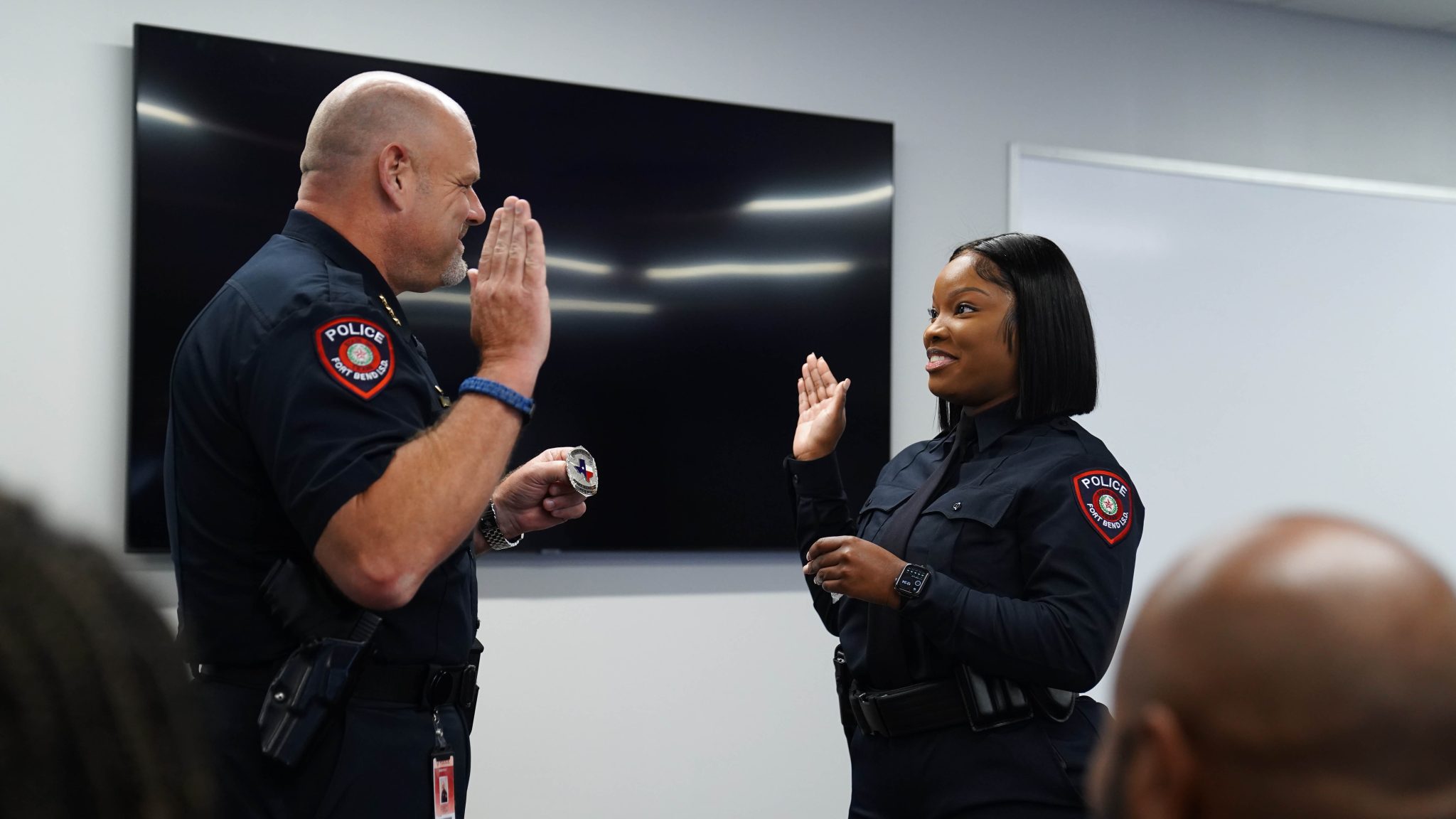 Former Fort Bend ISD student and cafeteria manager sworn in as officer